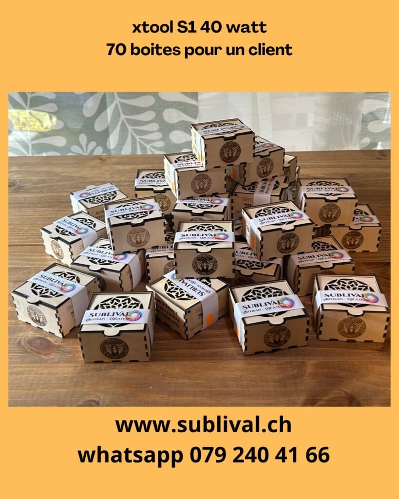 Pile of 70 brown Sublival boxes on a wooden table for a client, with xtool S1 40 watt branding visible
